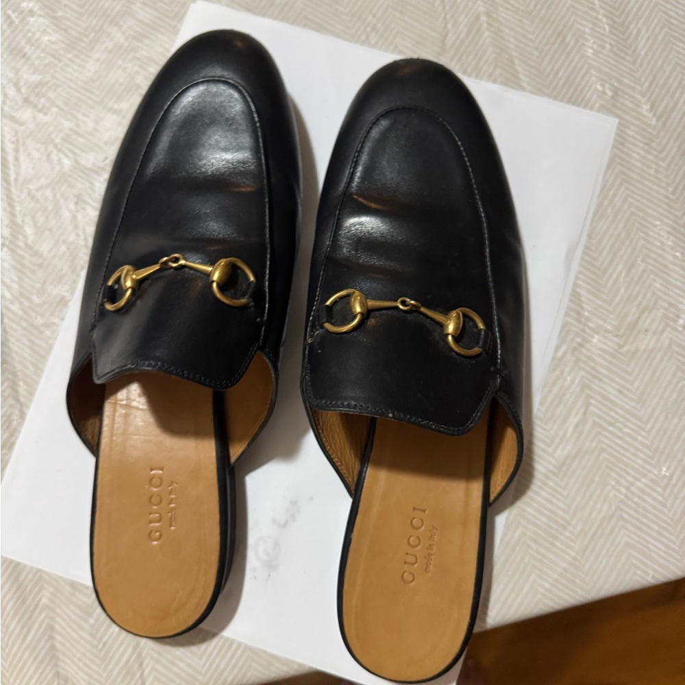 Gucci Black Leather Mules with Gold Accent